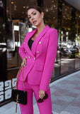Women’s fuchsia blazer and pants set featuring gold-tone buttons